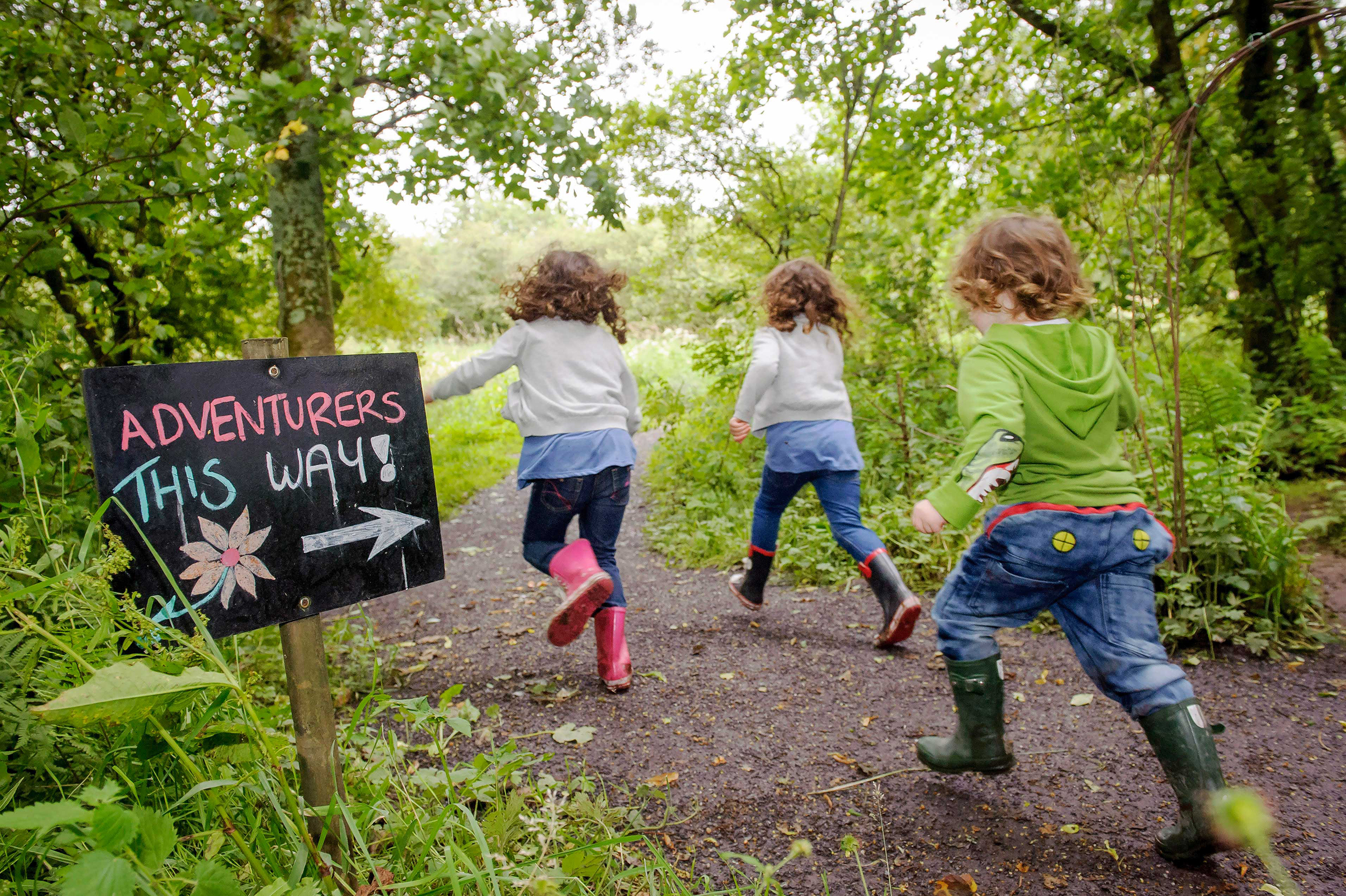 Children running into Lochwinnoch Reserve