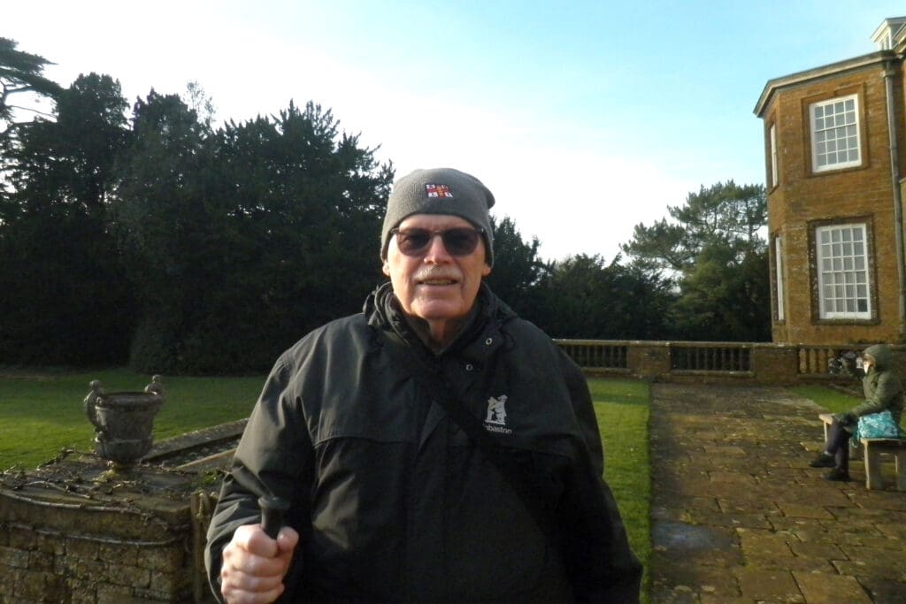 a man in a hat wearing sunglasses