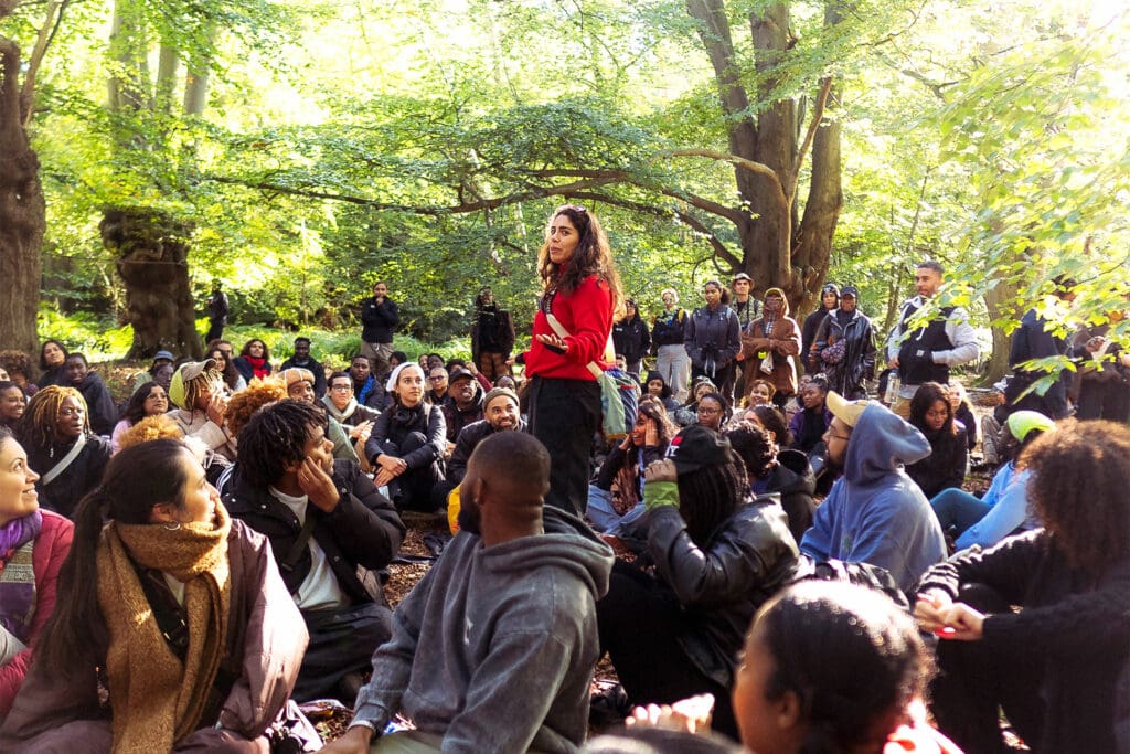 A group of people join a Flock Together event