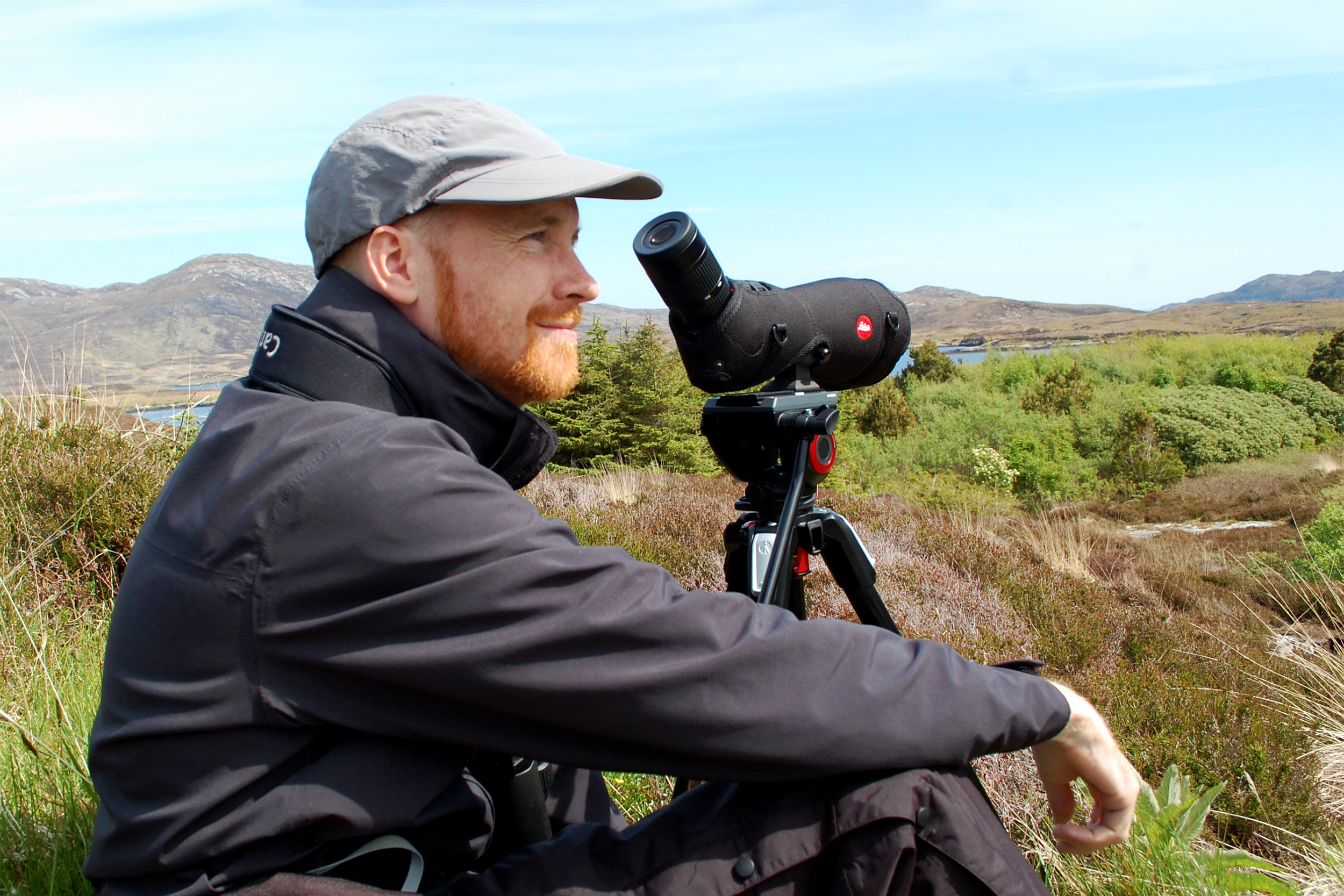 Benedict MacDonald looking out over a rural landscape