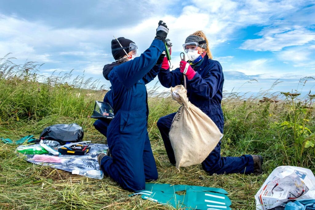 RSPB staff weighing a Gannet