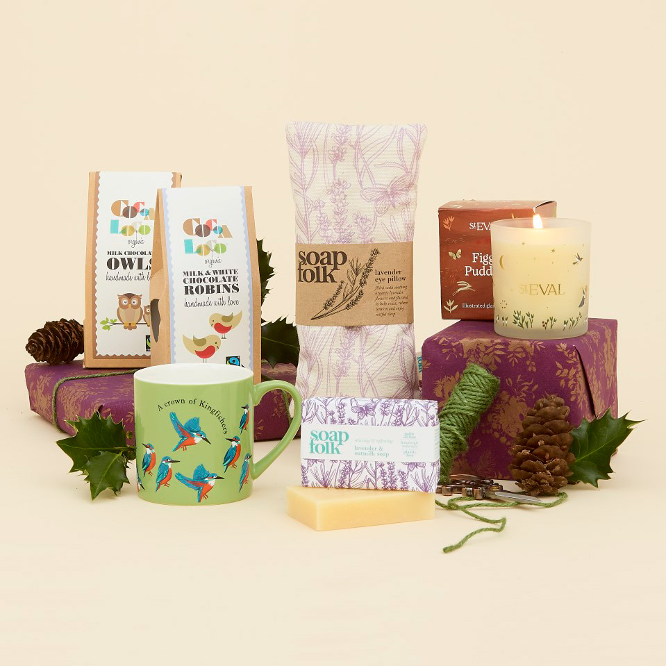 A range of festive gifts under £20, including soap, a bird mug and a candle.