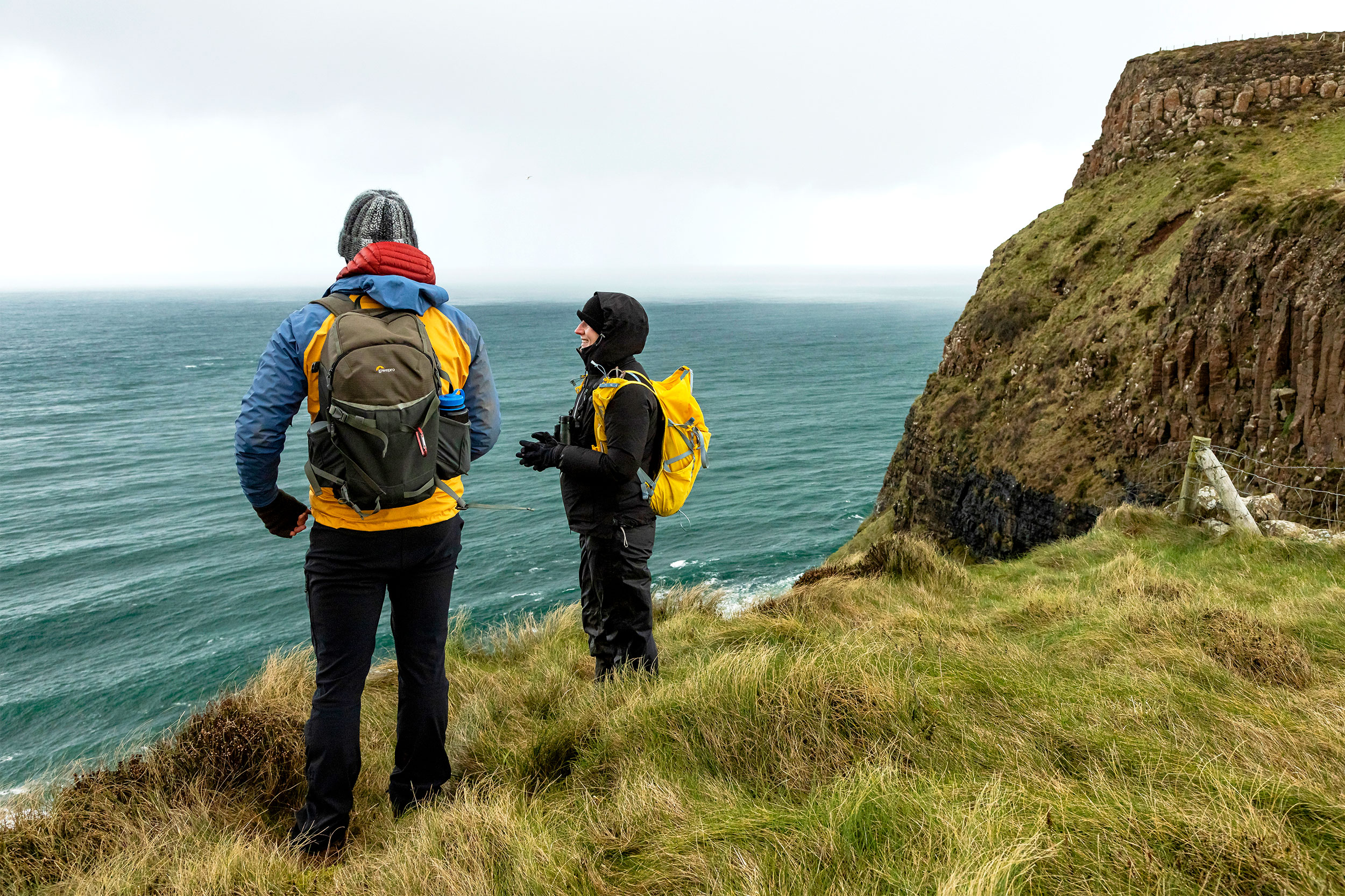Two adults exploring Rathlin Island in Northern Ireland.
